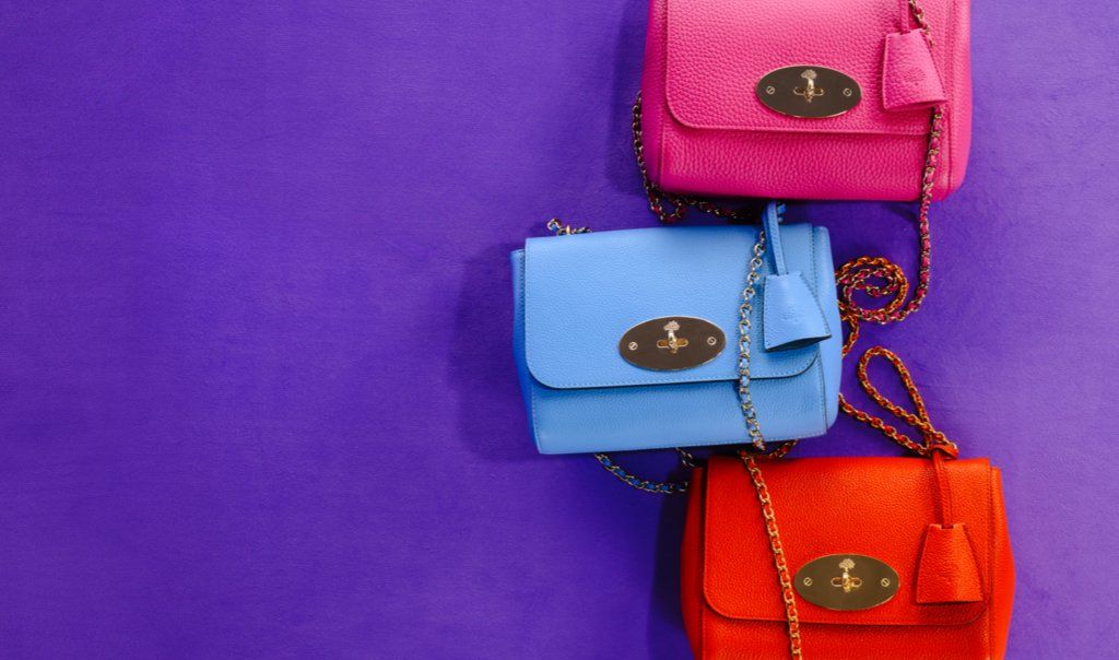 Three Mulberry Mini Lily bags in orange, pink and blue